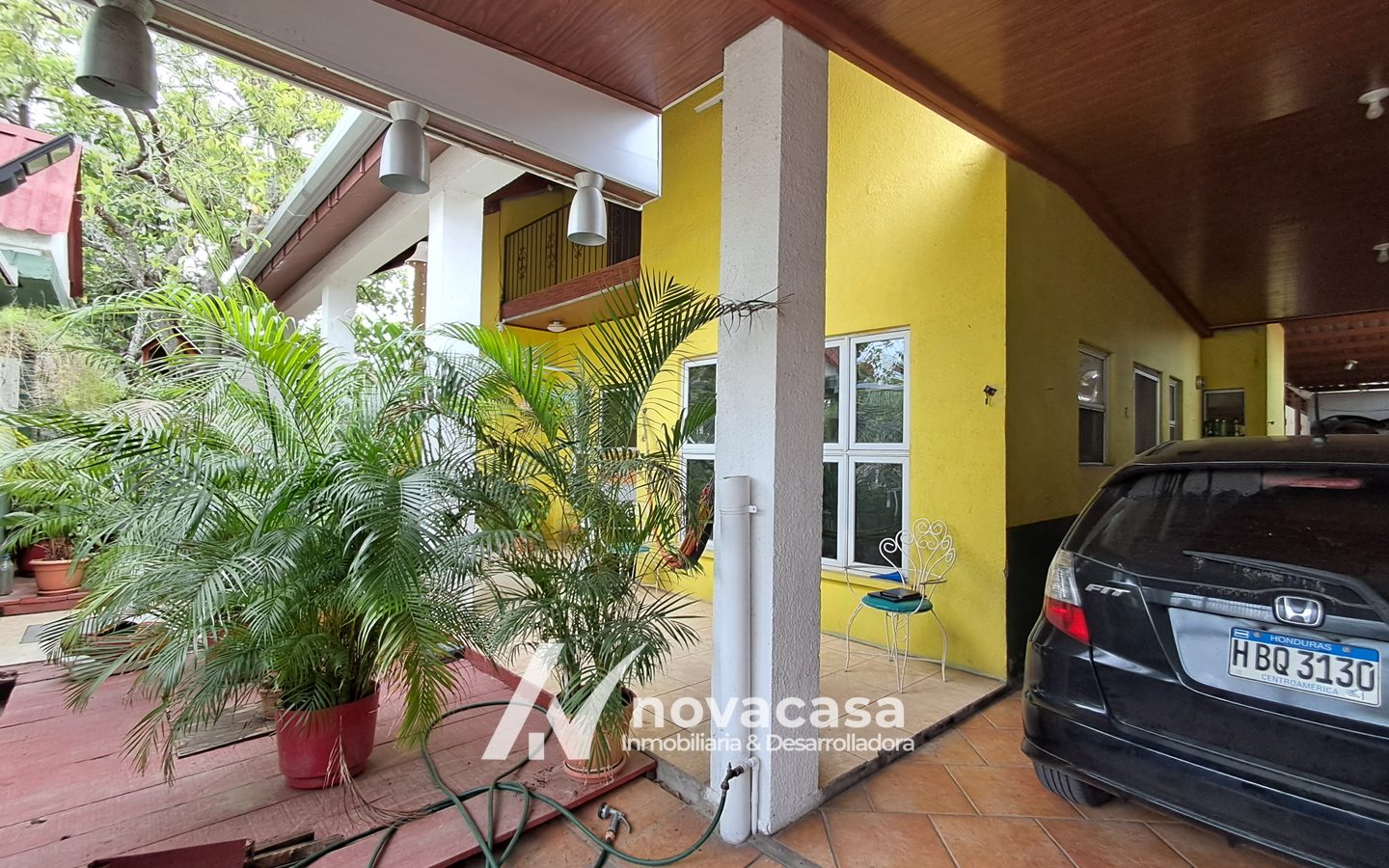 rela-los-naranjo-01-fachada-porche-01 Casa en venta en Residencial Los Naranjo, San Pedro Sula