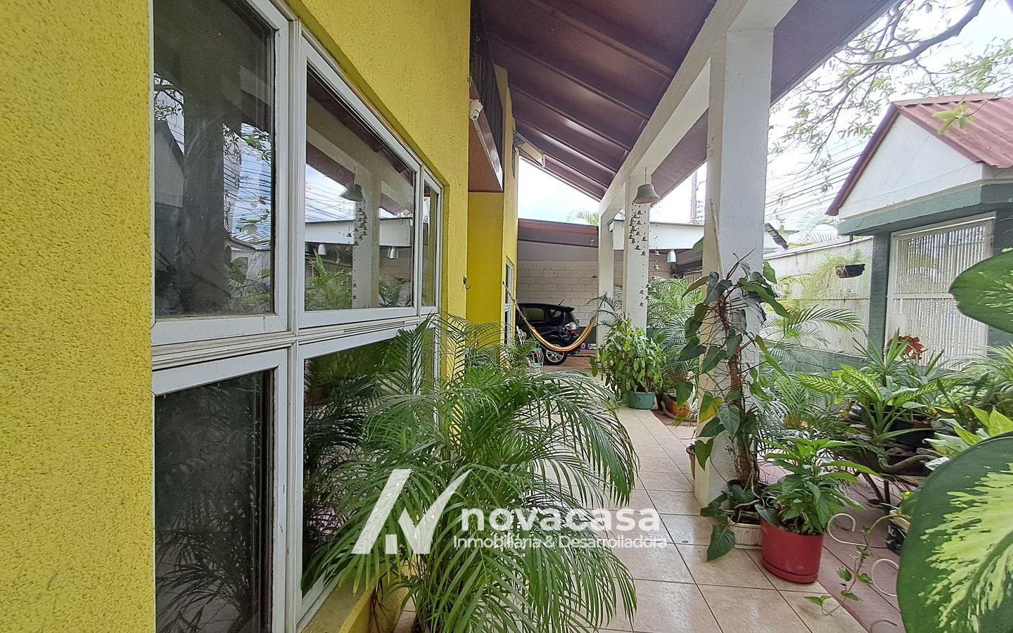 rela-los-naranjo-04-fachada-porche-04 Casa en venta en Residencial Los Naranjo, San Pedro Sula