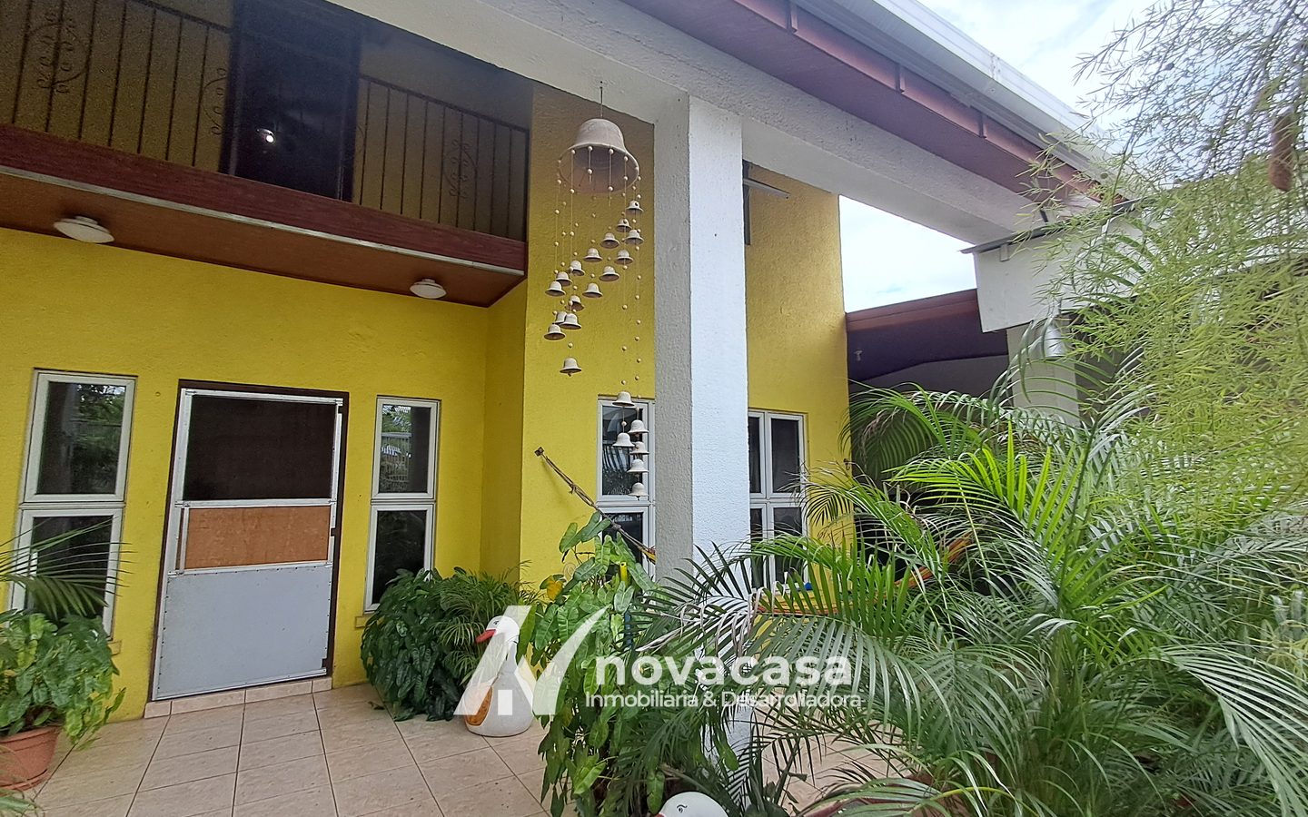 rela-los-naranjo-05-fachada-porche-05 Casa en venta en Residencial Los Naranjo, San Pedro Sula